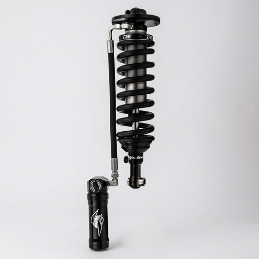 Black shock absorber on a white background