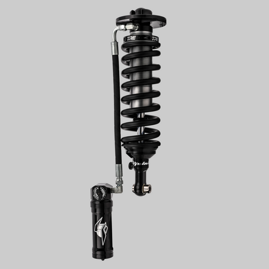 Black shock absorber on a white background
