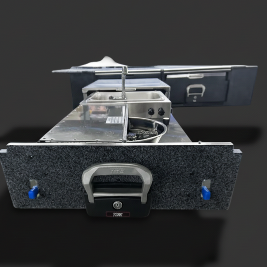 Portable kitchen stove with sink and cabinets on a white background