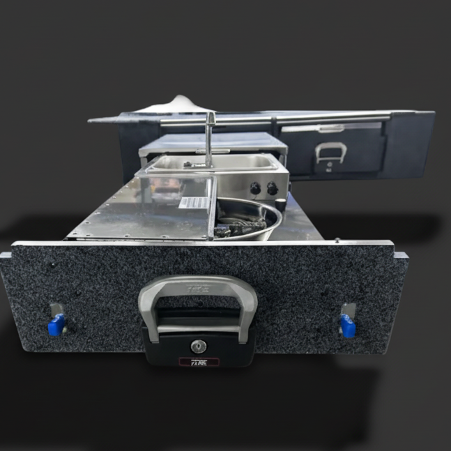 Portable kitchen stove with sink and cabinets on a white background